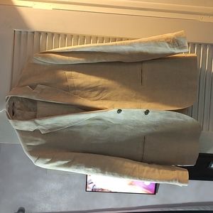 Men's cream colored linen suit